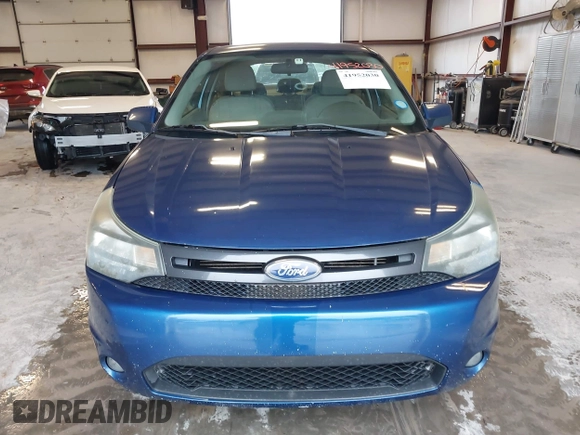 2009 Ford Focus SE with VIN 1FAHP32N09W244420, listed as a IAAI auction lot 41952030 with 165,886 mi miles. Bid and sale history available at carsss.com. Image 6.