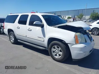 2011 GMC Yukon XL SLE z VIN 1GKS1HE0XBR241970, wystawiony jako IAAI lot #42317272 z przebiegiem 92 956 mil mil oraz . Historia ofert i sprzedaży dostępna na DreamBid. Obrazek 1.