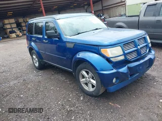 2010 Dodge Nitro SXT z VIN 1D4PT5GK0AW120120, wystawiony jako IAAI lot #42251615 z przebiegiem 114 627 mil mil oraz . Historia ofert i sprzedaży dostępna na DreamBid. Obrazek 1.