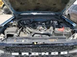 2023 Ford Bronco z VIN 1FMEE5DP0PLB83500, wystawiony jako Copart lot #54124945 z przebiegiem 42 661 mil mil oraz Szkoda całkowita • Salvage title. Historia ofert i sprzedaży dostępna na DreamBid. Obrazek 12.