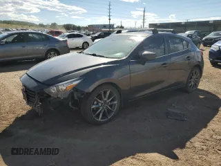 2018 Mazda 3 Touring z VIN 3MZBN1L31JM269318, wystawiony jako Copart lot #70481664 z przebiegiem 79 326 mil mil oraz Szkoda całkowita • Salvage title. Historia ofert i sprzedaży dostępna na DreamBid. Obrazek 1.