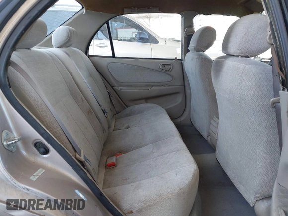 2002 Toyota Corolla CE with VIN 1NXBR12E82Z624794, listed as a IAAI auction lot 42571532 with 122,749 mi miles and . Bid and sale history available at DreamBid. Image 8.