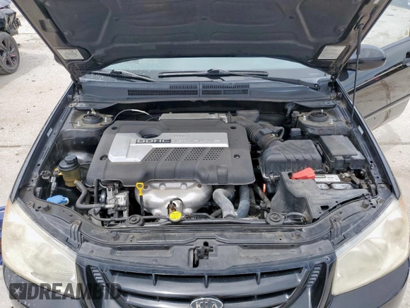 2006 Kia Spectra EX z VIN KNAFE121665281639, wystawiony jako Copart lot #54583825 z przebiegiem 121 167 mil mil oraz Szkoda całkowita • Salvage title. Historia ofert i sprzedaży dostępna na DreamBid. Obrazek 11.