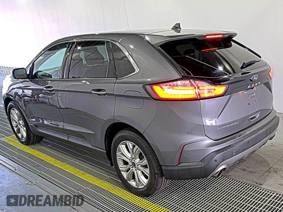 2021 Ford Edge Titanium z VIN 2FMPK3K92MBA53689, wystawiony jako IAAI lot #42501151 z przebiegiem 93 941 mil mil oraz . Historia ofert i sprzedaży dostępna na DreamBid. Obrazek 20.