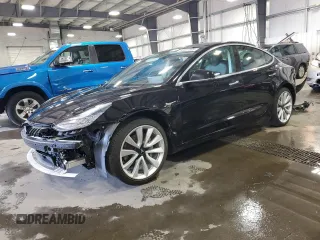2019 Tesla Model 3 Mid Range z VIN 5YJ3E1EA4KF310792, wystawiony jako Copart lot #53031595 z przebiegiem 99 799 mil mil oraz Szkody całkowita. Historia ofert i sprzedaży dostępna na DreamBid. Obrazek 1.