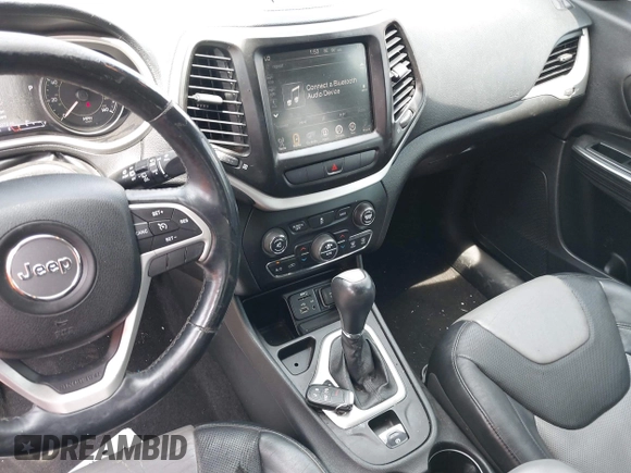 2014 Jeep Cherokee Limited with VIN 1C4PJLDS0EW134195, listed as a IAAI auction lot 42162971 with 182,272 mi miles and . Bid and sale history available at DreamBid. Image 13.