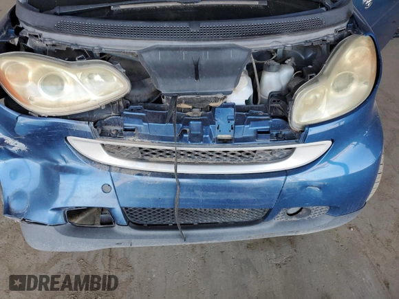 2010 Smart fortwo Pure с VIN WMEEJ3BA1AK360041, выставлен на аукционе Copart как лот 59594055 с пробегом Не указан миль и Списание • Salvage title. История ставок и продаж доступна на DreamBid. Изображение 11.