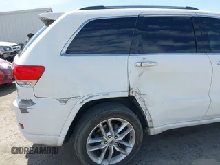2015 Jeep Grand Cherokee Overland with VIN 1C4RJFCG3FC230185, listed as a IAAI auction lot 42494650 with 123,128 mi miles and . Bid and sale history available at DreamBid. Image 6.
