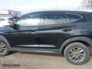 2016 Hyundai Tucson SE with VIN KM8J3CA42GU168610, listed as a IAAI auction lot 41639335 with 86,920 mi miles. Bid and sale history available at carsss.com. Image 13.
