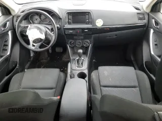 2015 Mazda CX-5 Sport z VIN JM3KE4BY2F0516574, wystawiony jako Copart lot #84100544 z przebiegiem Nie podano mil oraz Szkoda całkowita • Salvage title. Historia ofert i sprzedaży dostępna na DreamBid. Obrazek 8.