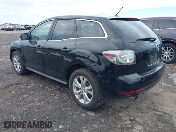 2011 Mazda CX-7 S Touring z VIN JM3ER4CL2B0362415, wystawiony jako IAAI lot #42214144 z przebiegiem 156 976 mil mil oraz . Historia ofert i sprzedaży dostępna na DreamBid. Obrazek 3.