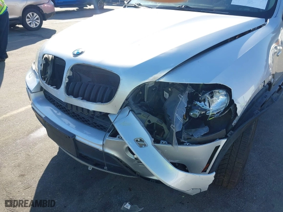 2011 BMW X5 35i with VIN 5UXZV4C5XBL412661, listed as a IAAI auction lot 41810470 with 168,470 mi miles. Bid and sale history available at carsss.com. Image 6.