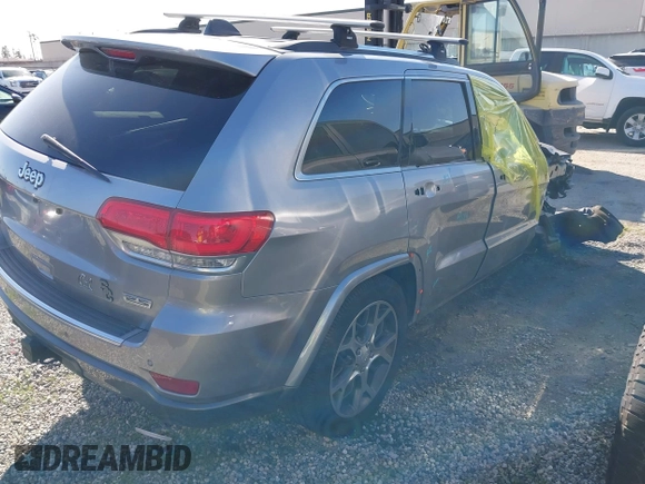 2018 Jeep Grand Cherokee Limited with VIN 1C4RJFBG4JC249418, listed as a IAAI auction lot 41621022 with 83,720 mi miles and . Bid and sale history available at DreamBid. Image 4.