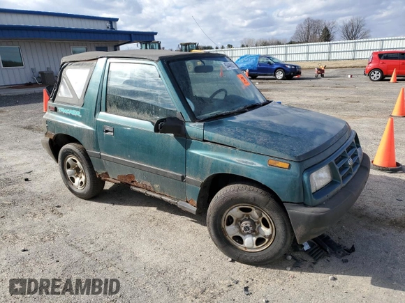 1996 Chevrolet Tracker z VIN 2CNBJ1863T6925397, wystawiony jako Copart lot #50446605 z przebiegiem 139 484 mil mil oraz Czysty tytuł • Clean title. Historia ofert i sprzedaży dostępna na DreamBid. Obrazek 4.
