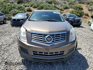 2015 Cadillac SRX Luxury Collection z VIN 3GYFNBE35FS555046, wystawiony jako Copart lot #57589155 z przebiegiem 108 456 mil mil oraz Szkoda całkowita • Salvage title. Historia ofert i sprzedaży dostępna na DreamBid. Obrazek 5.