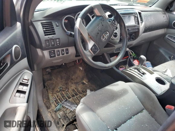 2015 Toyota Tacoma with VIN 3TMLU4EN7FM181570, listed as a Copart auction lot 53056985 with Not Provided miles and Salvage Title. Bid and sale history available at DreamBid. Image 8.