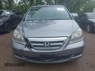2007 Honda Odyssey EX z VIN 5FNRL38407B084436, wystawiony jako IAAI lot #42355391 z przebiegiem 144 607 mil mil oraz . Historia ofert i sprzedaży dostępna na DreamBid. Obrazek 13.