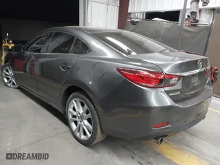 2017 Mazda Mazda6 Touring with VIN JM1GL1V5XH1146167, listed as a IAAI auction lot 41398814 with 59,590 mi miles. Bid and sale history available at carsss.com. Image 3.