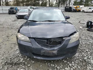 2006 Mazda 3 i Touring with VIN JM1BK32G761490132, listed as a Copart auction lot 52937645 with 146,299 mi miles and Salvage Title. Bid and sale history available at DreamBid. Image 5.