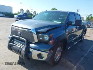 2010 Toyota Tundra with VIN 5TFEY5F11AX097360, listed as a IAAI auction lot 41990256 with 350,830 mi miles and . Bid and sale history available at DreamBid. Image 19.