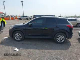 2016 Mazda CX-5 Sport with VIN JM3KE4BY8G0746377, listed as a IAAI auction lot 41990988 with 144,558 mi miles and . Bid and sale history available at carsss.com. Image 14.