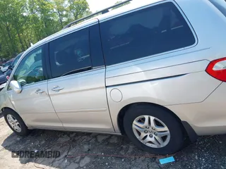 2007 Honda Odyssey EX-L z VIN 5FNRL38667B453060, wystawiony jako IAAI lot #42066637 z przebiegiem 184 439 mil mil oraz . Historia ofert i sprzedaży dostępna na DreamBid. Obrazek 14.