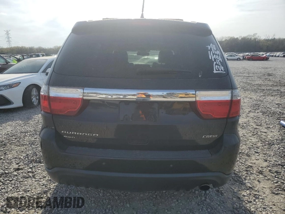 2013 Dodge Durango Crew z VIN 1C4RDJDG5DC675551, wystawiony jako Copart lot #50576895 z przebiegiem Nie podano mil oraz Szkoda całkowita • Salvage title. Historia ofert i sprzedaży dostępna na DreamBid. Obrazek 6.