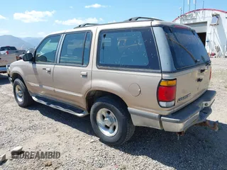 1996 Ford Explorer XL with VIN 1FMDU34X9TUA11179, listed as a IAAI auction lot 42713001 with 235,618 mi miles and . Bid and sale history available at DreamBid. Image 3.