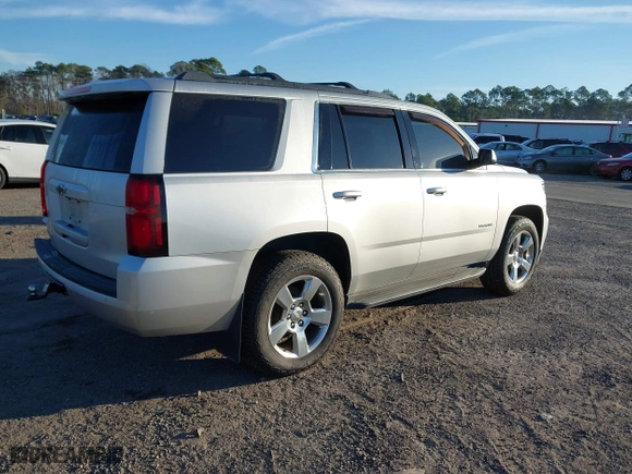 2017 Chevrolet Tahoe LS with VIN 1GNSCAKC6HR161464, listed as a IAAI auction lot 41440911 with 174,662 mi miles. Bid and sale history available at carsss.com. Image 4.