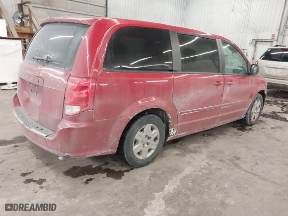 2012 Dodge Grand Caravan SE with VIN 2C4RDGBG7CR288009, listed as a IAAI auction lot 41557118 with 223,287 mi miles. Bid and sale history available at carsss.com. Image 4.