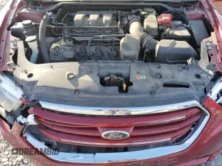 2014 Ford Taurus Limited with VIN 1FAHP2F81EG183128, listed as a Copart auction lot 82409384 with 107,624 mi miles and Salvage title. Bid and sale history available at DreamBid. Image 11.