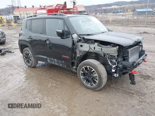2023 Jeep Renegade Trailhawk z VIN ZACNJDC10PPP73292, wystawiony jako IAAI lot #41661916 z przebiegiem 19 192 mil mil oraz . Historia ofert i sprzedaży dostępna na DreamBid. Obrazek 1.