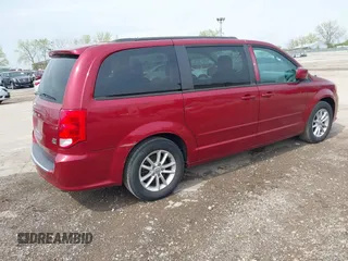 2014 Dodge Grand Caravan SXT with VIN 2C4RDGCG4ER120877, listed as a IAAI auction lot 42142083 with 199,895 mi miles and . Bid and sale history available at DreamBid. Image 4.
