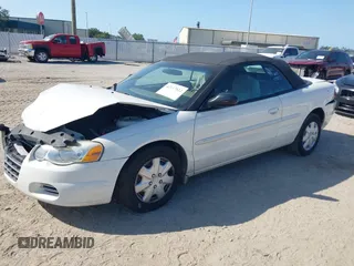 2004 Chrysler Sebring LX z VIN 1C3EL45X14N328051, wystawiony jako IAAI lot #42117822 z przebiegiem 129 535 mil mil oraz . Historia ofert i sprzedaży dostępna na DreamBid. Obrazek 2.