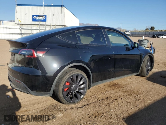 2023 Tesla Model Y Performance with VIN 7SAYGDEF3PF847225, listed as a Copart auction lot 52171135 with 29,724 mi miles and Salvage Title. Bid and sale history available at DreamBid. Image 3.