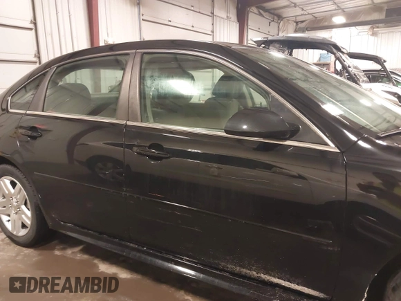 2014 Chevrolet Impala LT with VIN 2G1WB5E32E1127731, listed as a IAAI auction lot 42018987 with 163,649 mi miles and . Bid and sale history available at DreamBid. Image 13.