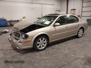 2002 Nissan Maxima GLE z VIN JN1DA31AX2T305310, wystawiony jako IAAI lot #42302521 z przebiegiem 68 920 mil mil oraz . Historia ofert i sprzedaży dostępna na DreamBid. Obrazek 2.