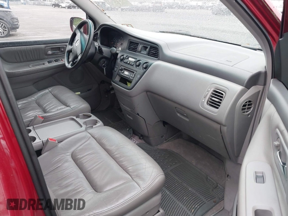 2003 Honda Odyssey EX-L with VIN 5FNRL18993B009180, listed as a IAAI auction lot 42224572 with 187,781 mi miles and . Bid and sale history available at DreamBid. Image 5.
