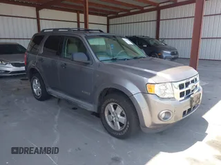 2008 Ford Escape XLT with VIN 1FMCU93138KB25855, listed as a IAAI auction lot 42144689 with 133,591 mi miles. Bid and sale history available at carsss.com. Image 1.
