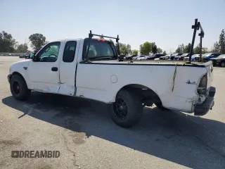 2003 Ford F-150 XL with VIN 1FTRX17W53NA54971, listed as a Copart auction lot 63686385 with 133,800 mi miles and Salvage title. Bid and sale history available at DreamBid. Image 2.