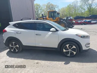 2016 Hyundai Tucson Eco with VIN KM8J3CA22GU076489, listed as a IAAI auction lot 42169732 with 153,597 mi miles. Bid and sale history available at carsss.com. Image 13.
