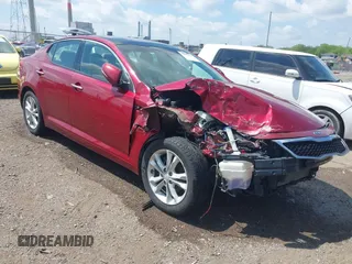 2012 Kia Optima EX z VIN 5XXGN4A77CG008747, wystawiony jako IAAI lot #42202927 z przebiegiem 221 322 mil mil oraz . Historia ofert i sprzedaży dostępna na DreamBid. Obrazek 1.