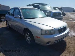 2003 Hyundai Elantra GLS z VIN KMHDN45D53U707173, wystawiony jako IAAI lot #41975083 z przebiegiem 128 149 mil mil oraz . Historia ofert i sprzedaży dostępna na DreamBid. Obrazek 1.