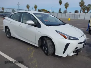 2020 Toyota Prius L Eco z VIN JTDKARFUXL3123733, wystawiony jako IAAI lot #41560781 z przebiegiem 67 980 mil mil oraz . Historia ofert i sprzedaży dostępna na DreamBid. Obrazek 1.
