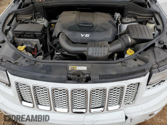 2015 Jeep Grand Cherokee Summit with VIN 1C4RJEJG8FC118673, listed as a Copart auction lot 84052044 with 182,806 mi miles and Salvage title. Bid and sale history available at DreamBid. Image 13.