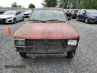 1992 Toyota Pickup DLX z VIN JT4RN93P4N5064218, wystawiony jako Copart lot #58095635 z przebiegiem 256 271 mil mil oraz Tytuł czysty. Historia ofert i sprzedaży dostępna na DreamBid. Obrazek 6.