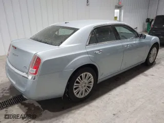 2013 Chrysler 300 with VIN 2C3CCAKG0DH604318, listed as a IAAI auction lot 41531406 with 51,765 mi miles. Bid and sale history available at carsss.com. Image 4.