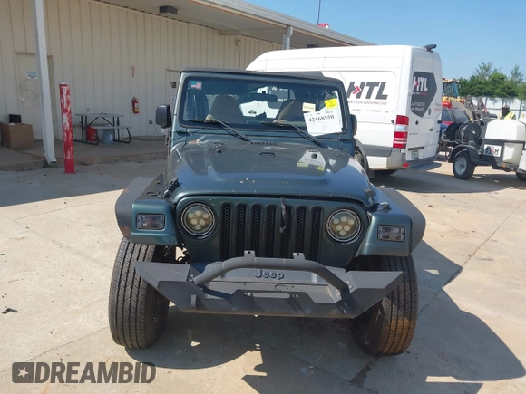 2002 Jeep Wrangler Sport with VIN 1J4FA49S52P760173, listed as a IAAI auction lot 42468550 with 201,682 mi miles and . Bid and sale history available at DreamBid. Image 12.