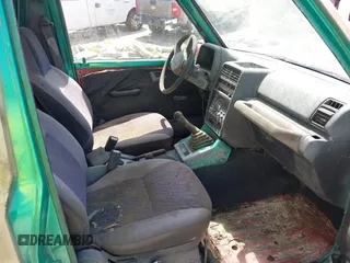 1995 Chevrolet Tracker z VIN 2CNBJ1869S6911342, wystawiony jako IAAI lot #42265392 z przebiegiem 121 944 mil mil oraz . Historia ofert i sprzedaży dostępna na DreamBid. Obrazek 5.
