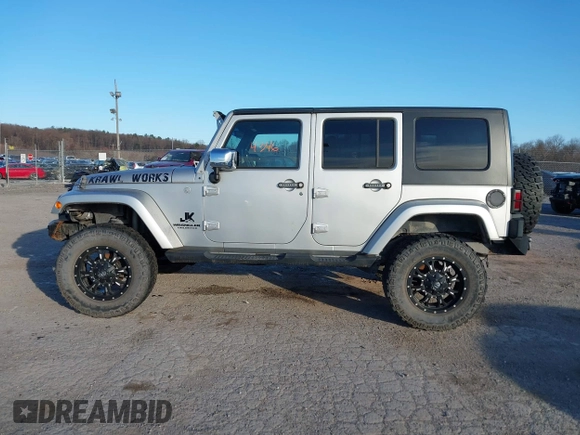 2010 Jeep Wrangler Unlimited Sahara with VIN 1J4BA5H14AL230604, listed as a IAAI auction lot 41884346 with 97,060 mi miles. Bid and sale history available at carsss.com. Image 14.